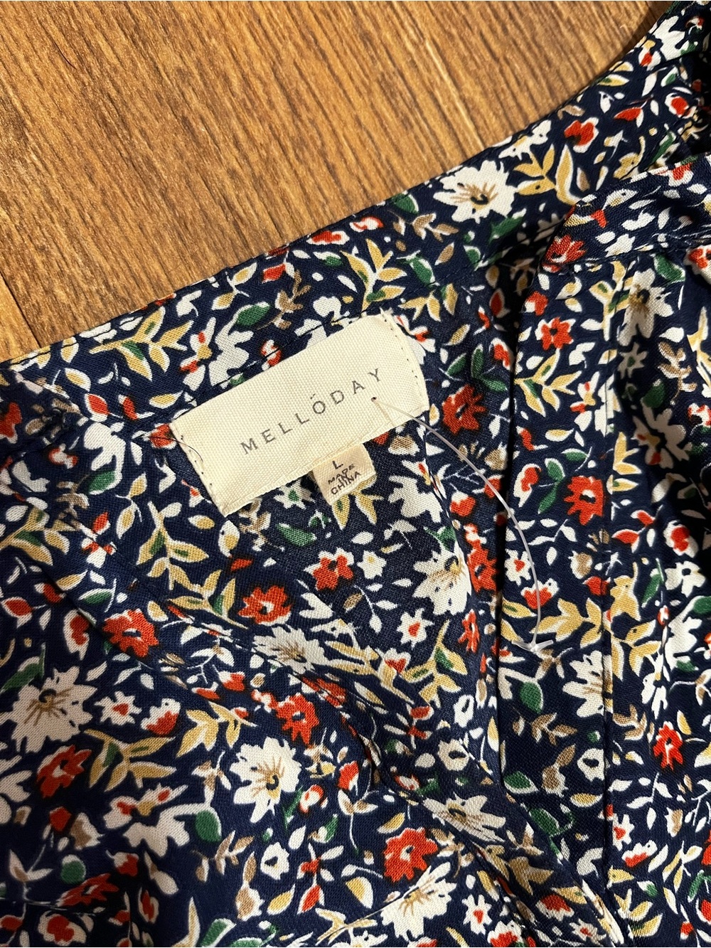 MELLODAY Navy Floral Top with Red, White & Green Accents